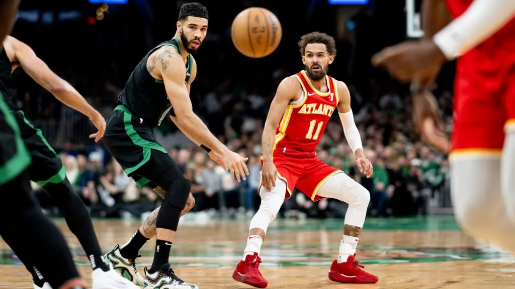 Jayson Tatum #0 of the Boston Celtics and Trae Young #11 of the Atlanta Hawks look on during the first half at TD Garden. (Maddie Malhotra/Getty Images)