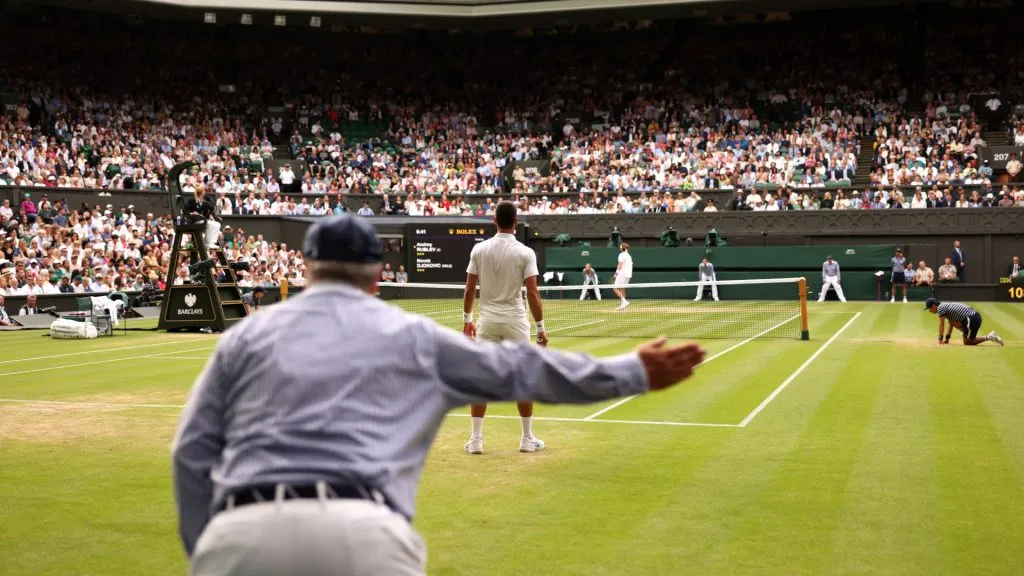 A line judge calls out during the Men’s Singles Quarter Final match between Novak Djokovic of Serbia and Andrey Rublev during 2023 Wimbledon. (Julian Finney/Getty Images)