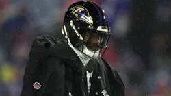 Lamar Jackson #8 of the Baltimore Ravens warms up prior to the game against the Buffalo Bills in the AFC Divisional Playoff at Highmark Stadium on January 19, 2025 in Orchard Park, New York.