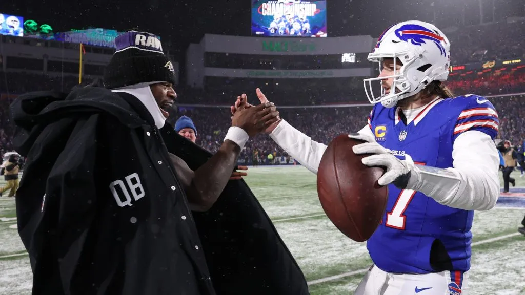 Lamar Jackson #8 of the Baltimore Ravens and Josh Allen #17 of the Buffalo Bills embrace after the AFC Divisional Playoff game at Highmark Stadium on January 19, 2025 in Orchard Park, New York.
