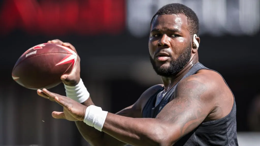 Cardale Jones #12 of the DC Defenders warms up before the XFL game against the St. Louis Battlehawks at Audi Field on March 8, 2020 in Washington, DC.