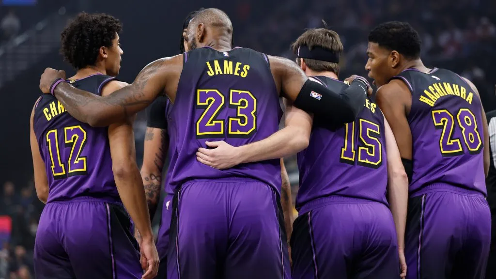 LeBron James #23 of the Los Angeles Lakers huddles up with the team during play against the LA Clippers at Intuit Dome. (Ronald Martinez/Getty Images)