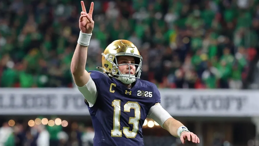Riley Leonard #13 of the Notre Dame Fighting Irish signals for a two point conversion against the Ohio State Buckeyes during the fourth quarter in the 2025 CFP National Championship at the Mercedes-Benz Stadium on January 20, 2025 in Atlanta, Georgia.