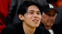 Roki Sasaki of the Los Angeles Dodgers attends a game between the Washington Wizards and the Los Angeles Lakers in the first half at Crypto.com Arena on January 21, 2025 in Los Angeles, California.