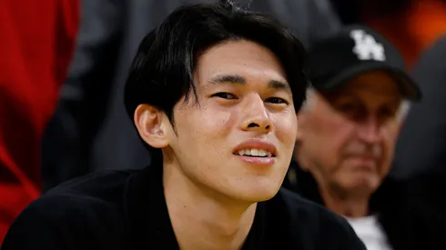 Roki Sasaki of the Los Angeles Dodgers attends a game between the Washington Wizards and the Los Angeles Lakers in the first half at Crypto.com Arena on January 21, 2025 in Los Angeles, California.