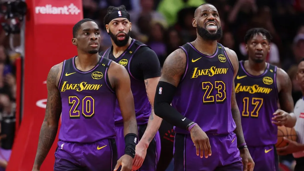 Shake Milton #20, Anthony Davis #3, LeBron James #23 and Dorian Finney-Smith #17 of the Los Angeles Lakers reacts against the Houston Rockets. (Alex Slitz/Getty Images)