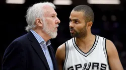 Gregg Popovich of the San Antonio Spurs talks with Tony Parker during an NBA game against the Sacramento Kings on October 27, 2016.