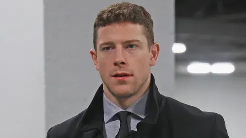 Charlie Coyle #13 of the Boston Bruins arrives for the game against the New York Islanders at UBS Arena on November 27, 2024 in Elmont, New York.