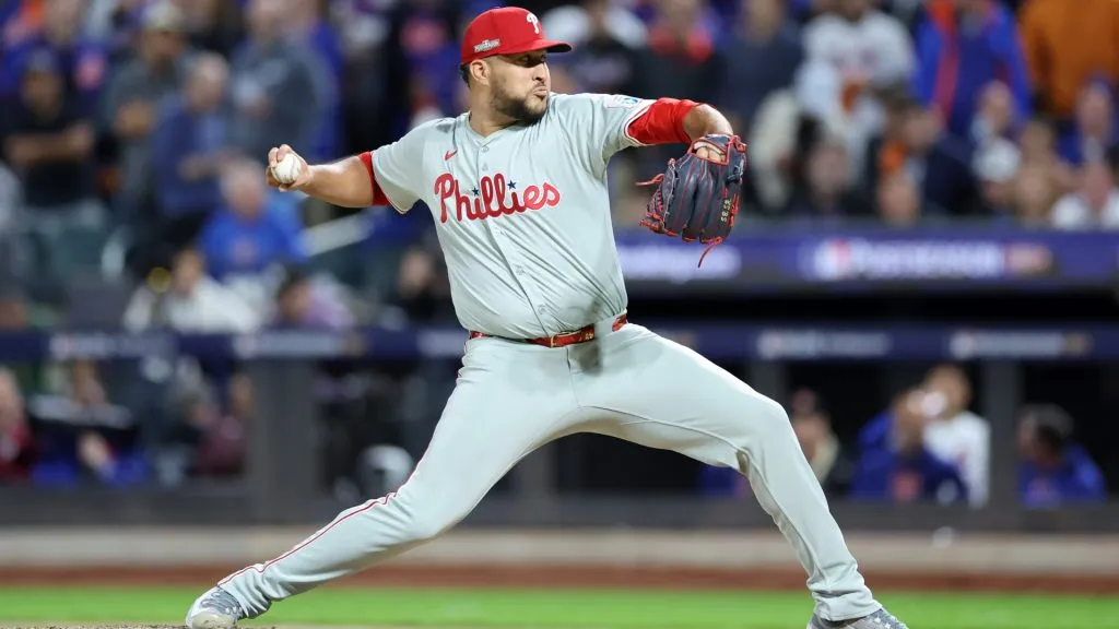 Carlos Estevez #53 of the Philadelphia Phillies delivers a pitch in the eighth inning against the New York Mets during Game Three of the Division Series at Citi Field on October 08, 2024 in New York City. (Photo by Luke Hales/Getty Images)