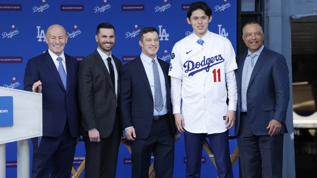 (L-R) President and CEO Stan Kasten, Executive Vice President and General Manager Brandon Gomes, President Baseball Operations Andrew Friedman, Pitcher Roki Sasaki and Manager Dave Roberts speaks pose during a Los Angeles Dodgers press conference at Dodger Stadium on January 22, 2025 in Los Angeles, California. (Photo by Kevork Djansezian/Getty Images)