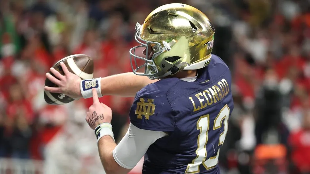 Riley Leonard #13 of the Notre Dame Fighting Irish celebrates a first quarter touchdown against the Ohio State Buckeyes during the 2025 CFP National Championship at the Mercedes-Benz Stadium on January 20, 2025 in Atlanta, Georgia.