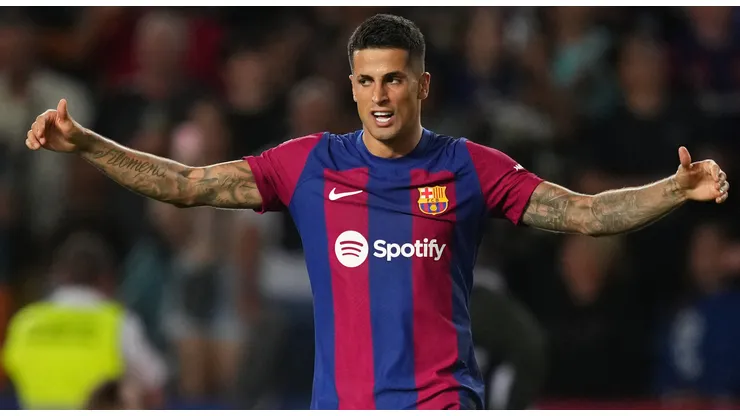 Joao Cancelo of Barcelona celebrates after scoring the team's third goal during the LaLiga EA Sports match between FC Barcelona and Celta Vigo at Estadi Olimpic Lluis Companys on September 23, 2023 in Barcelona, Spain.