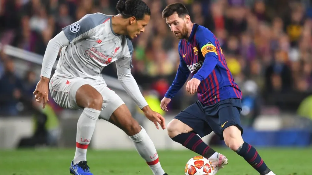 Virgil van Dijk of Liverpool and Lionel Messi of Barcelona in action during the UEFA Champions League Semi Final first leg match between Barcelona and Liverpool. (Michael Regan/Getty Images)