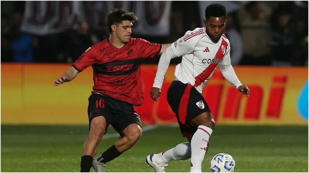 Vicente Taborda of Platense vies for the ball with Miguel Borja of River – Daniel Jayo/Getty Images