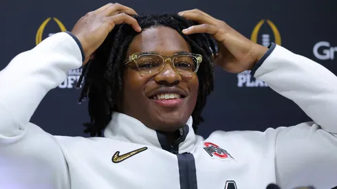 Jeremiah Smith #4 of the Ohio State Buckeyes speaks to the media during the Ohio State Buckeyes media day at the Georgia World Congress Center prior to the 2025 CFP National Championship between the Ohio State Buckeyes and Notre Dame Fighting Irish on January 18, 2025 in Atlanta, Georgia.