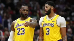 Anthony Davis #3 of the Los Angeles Lakers and LeBron James #23 of the Los Angeles Lakers talk during the game against the New Orleans Pelicans.