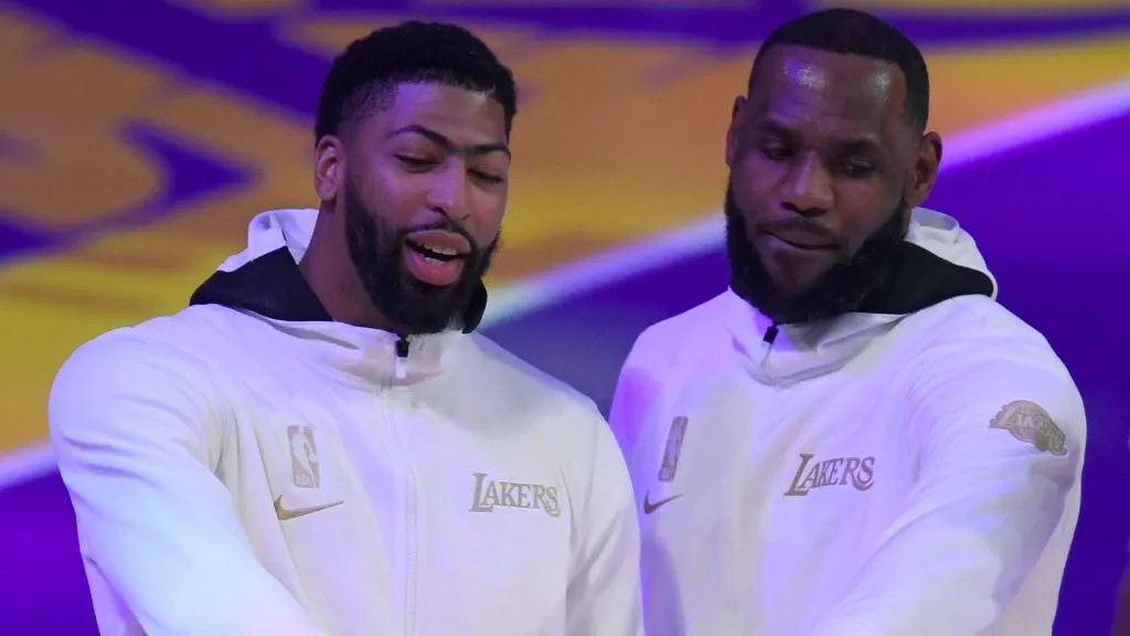 LeBron James #23 and Anthony Davis #3 of the Los Angeles Lakers pose with their rings during the 2020 NBA championship ring ceremony. (Harry How/Getty Images)