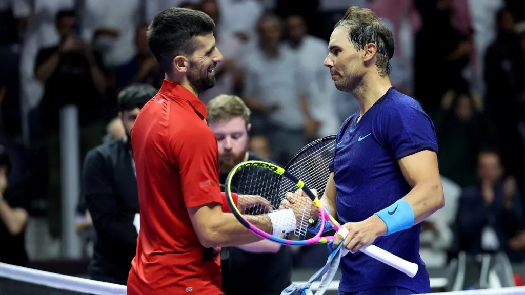 Novak Djokovic of Serbia (left) shakes hands with Rafael Nadal of Spain after defeating him at the Six Kings Slam 2024. (Richard Pelham/Getty Images)
