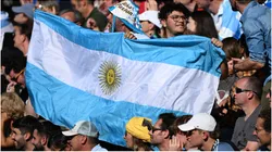 An Argentina flag is displayed in the crowd
