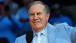 Head coach Bill Belichick of the North Carolina Tar Heels addresses the crowd during halftime in the game against the La Salle Explorers at the Dean E. Smith Center on December 14, 2024 in Greensboro, North Carolina.