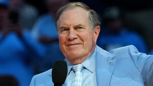 Head coach Bill Belichick of the North Carolina Tar Heels addresses the crowd during halftime in the game against the La Salle Explorers at the Dean E. Smith Center on December 14, 2024 in Greensboro, North Carolina.