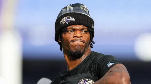 Lamar Jackson #8 of the Baltimore Ravens warms up before a preseason game against the Philadelphia Eagles at M&T Bank Stadium on August 9, 2024 in Baltimore, Maryland.