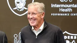 Owner and managing general partner Mark Davis (C) of the Las Vegas Raiders poses for photos with John Spytek (L) and Pete Carroll (R) during a news conference introducing Spytek as the general manager and Carroll as the head coach of the Raiders at the Las Vegas Raiders Headquarters/Intermountain Healthcare Performance Center on January 27, 2025 in Henderson, Nevada.