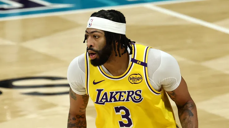 Anthony Davis #3 of the Los Angeles Lakers brings the ball up court during the first half of the game against the Charlotte Hornets