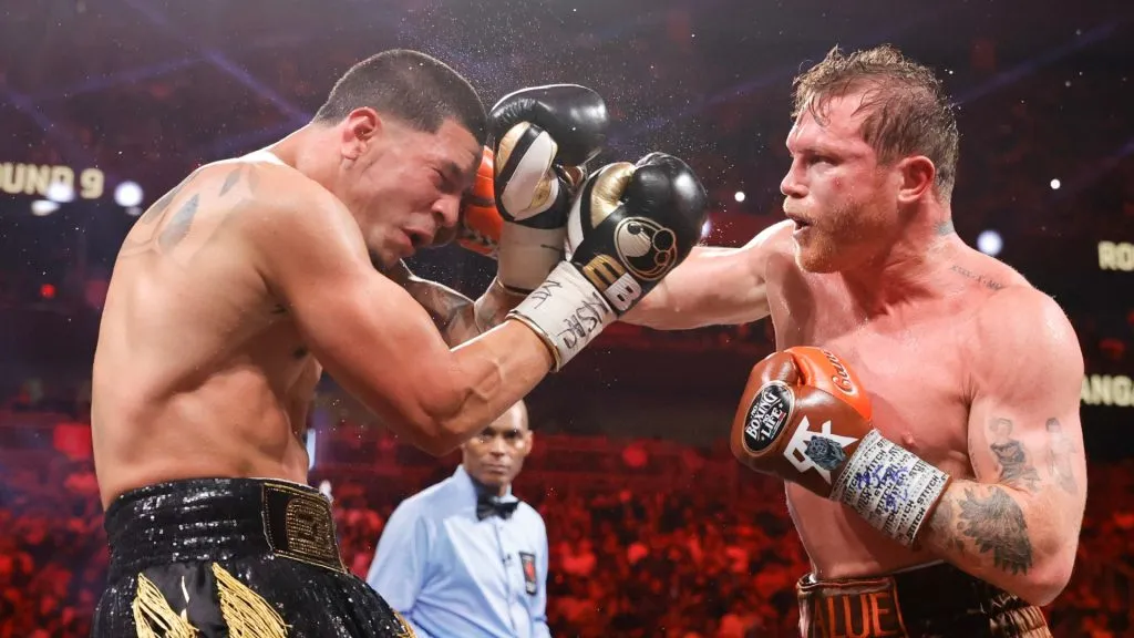 : WBC/WBA/WBO super middleweight champion Canelo Alvarez (R) punches Edgar Berlanga during the ninth round of a title fight at T-Mobile Arena on September 14, 2024 in Las Vegas, Nevada. (Photo by Steve Marcus/Getty Images)