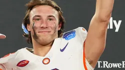 Dabo Swinney, Cade Klubnik #2 and the Clemson Tigers celebrate after winning the 2024 ACC Football Championship at Bank of America Stadium on December 07, 2024 in Charlotte, North Carolina.
