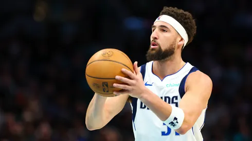 lay Thompson #31 of the Dallas Mavericks shoots the ball during the first half of a basketball game against the Charlotte Hornets