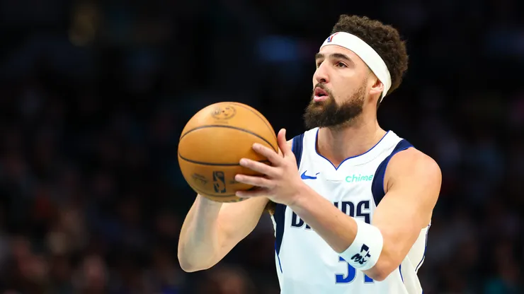 lay Thompson #31 of the Dallas Mavericks shoots the ball during the first half of a basketball game against the Charlotte Hornets