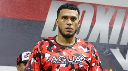 Boxer David Benavidez stands in the ring during a workout as his wife Karina Silva (R) looks on at Pound 4 Pound Gym on January 09, 2025 in Las Vegas, Nevada. Benavidez is scheduled to meet WBA light heavyweight champion David Morrell Jr. in a bout at T-Mobile Arena in Las Vegas on February 01.