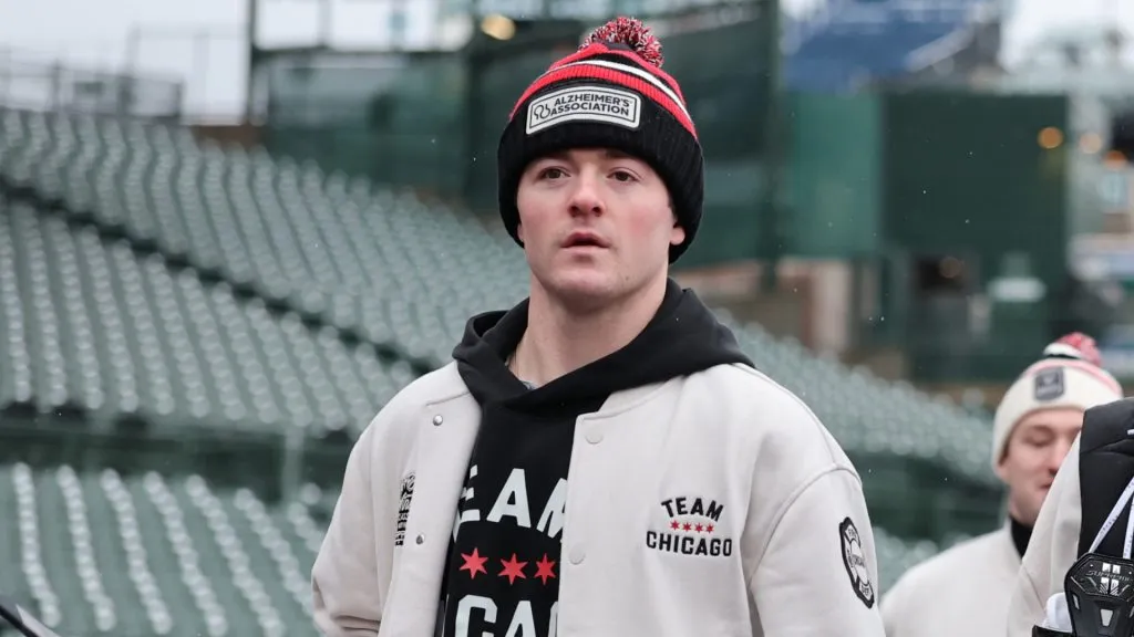 Ryan Donato #8 and Craig Smith #15 of the Chicago Blackhawks arrive inside Wrigley Field prior to the 2024 NHL Winter Classic against the St. Louis Blues on December 31, 2024 in Chicago, Illinois.