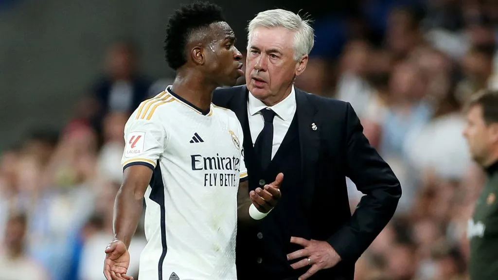 Vinicius Junior interacts with Carlo Ancelotti, head coach of Real Madrid, on April 21, 2024 in Madrid, Spain.