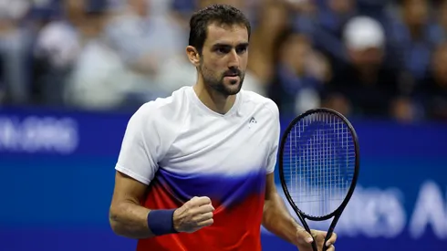 Marin Cilic of Croatia reacts against Carlos Alcaraz of Spain during their match of the 2022 US Open.