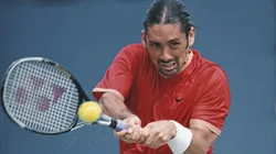 Marcelo Rios of Chile makes a double backhand return to Andrei Pavel during their Men's Singles second round match at the US Open.