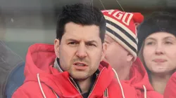 General manager Kyle Davidson of the Chicago Blackhawks looks on during practice prior to the 2024 NHL Winter Classic against the St. Louis Blues at Wrigley Field on December 30, 2024 in Chicago, Illinois.