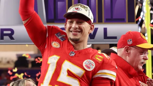 Patrick Mahomes #15 of the Kansas City Chiefs holds the Lombardi Trophy after defeating the San Francisco 49ers 25-22 during Super Bowl LVIII in 2024.