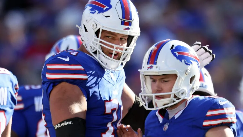 Tyler Bass #2 of the Buffalo Bills celebrates after kicking a field goal with teammate Ryan Van Demark #74 against the Tennessee Titans during the third quarter at Highmark Stadium on October 20, 2024 in Orchard Park, New York.