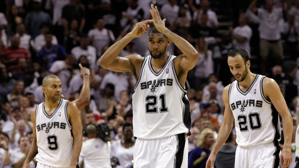 Tim Duncan #21 of the San Antonio Spurs calls a timeout as Tony Parker #9 and Manu Ginobili #20 look on against the Oklahoma City Thunder. (Tom Pennington/Getty Images)