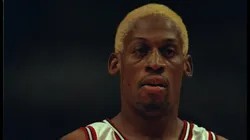 Dennis Rodman #91 of the Chicago Bulls stands on the court at the United Center in Chicago.