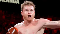 WBC/WBA/WBO super middleweight champion Canelo Alvarez punches Edgar Berlanga during the first round of a title fight at T-Mobile Arena on September 14, 2024 in Las Vegas, Nevada.