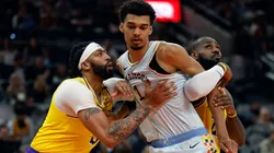 Victor Wembanyama blocks out Anthony Davis during a game between the San Antonio Spurs and the Los Angeles Lakers at Frost Bank Center on November 27, 2024.