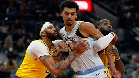 Victor Wembanyama blocks out Anthony Davis during a game between the San Antonio Spurs and the Los Angeles Lakers at Frost Bank Center on November 27, 2024.