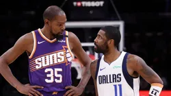 Kevin Durant #35 of the Phoenix Suns talks with Kyrie Irving #11 of the Dallas Mavericks during the second half