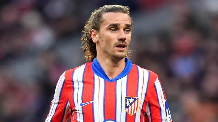 Antoine Griezmann of Atletico Madrid #7 looks on.