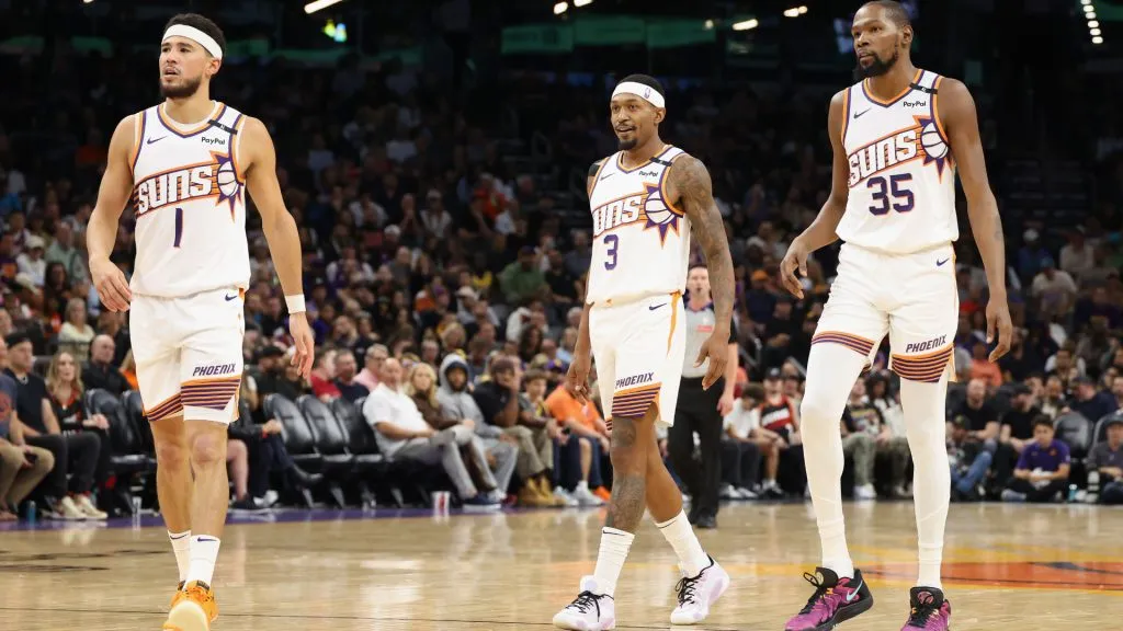 Devin Booker #1, Bradley Beal #3 and Kevin Durant #35 of the Phoenix Suns walk on the court during the first half of the NBA game against the Los Angeles Lakers. (Christian Petersen/Getty Images)