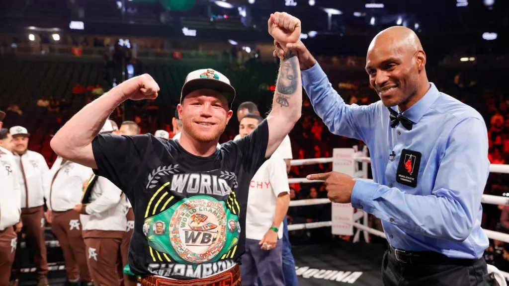 WBC/WBA/WBO super middleweight champion Canelo Alvarez poses for a photo with referee Harvey Dock after Alvarez’s won a title fight by unanimous decision against Edgar Berlanga, not pictured, at T-Mobile Arena on September 14, 2024 in Las Vegas, Nevada. (Photo by Steve Marcus/Getty Images)