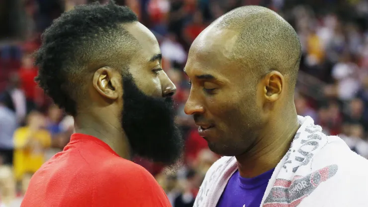 James Harden of the Houston Rockets greets Kobe Bryant of the Los Angeles Lakers on December 12, 2015 in Houston, Texas.